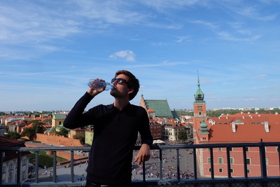 photo of me drinking water on top a tower